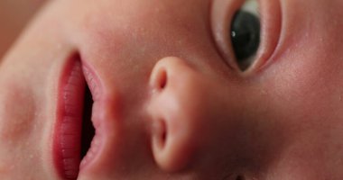 Macro closeup of newborn baby infant face
