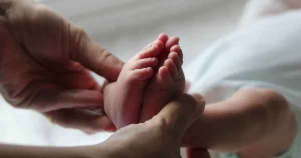 Beautiful newborn baby infant foot and feet together