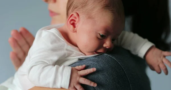 Mom Holding Newborn Baby Tapping Infant Back Help Cough Stockbild