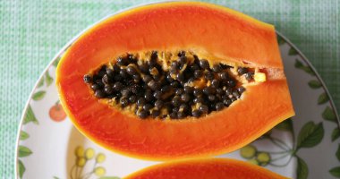 Tropical papaya fruit on plate