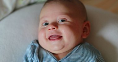 Baby newborn portrait smile face