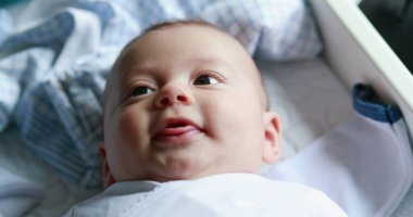 Cute baby newborn different face portrait reactions interacting with mom