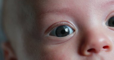Macro baby newborn eyes closeup