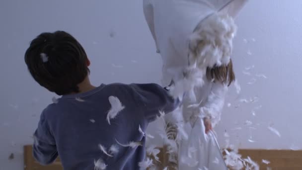 Fun Playful Activity Children Pillow Fight Feathers Flying Super Slow — Stock video