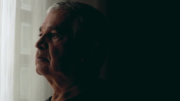 Thoughtful Senior Citizen Observing Neighborhood Window Reflecting Life — Stock Video