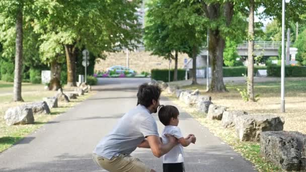 Father Lifts His Little Boy Sit Him His Shoulders Horseplay — Stock Video