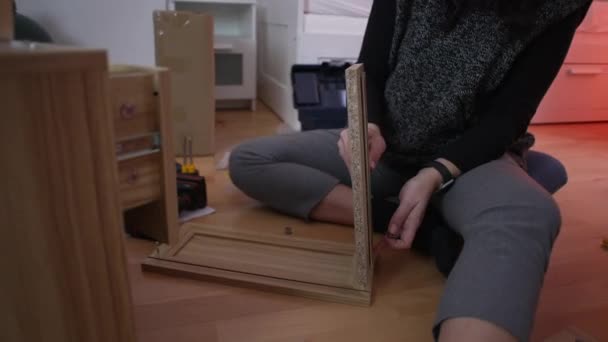 Woman Assembling Furniture Home Diy Home Setup Putting Together Nightstand — Stock Video