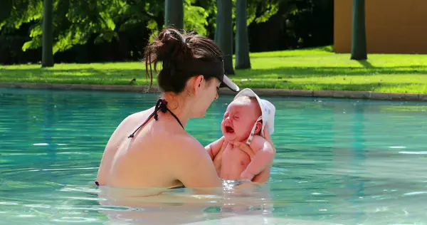 Mother Newborn Swimming Pool Crying Displeased Stock Picture