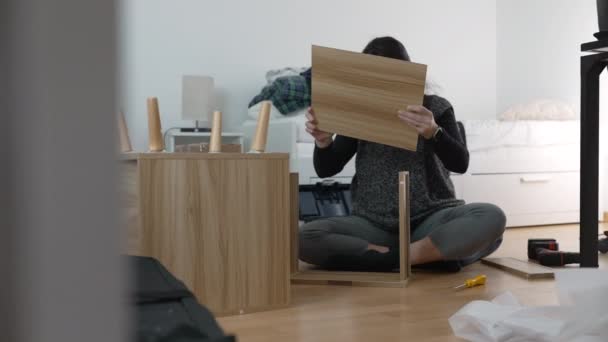 Furniture Assembly Expertise Captured Spirited Woman Building Nightstand Emphasizing Diy — Stock Video