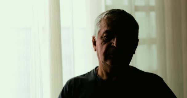 Depressed Somber Senior Man Standing Window Dark Struggling Mental Illness — Stock Video