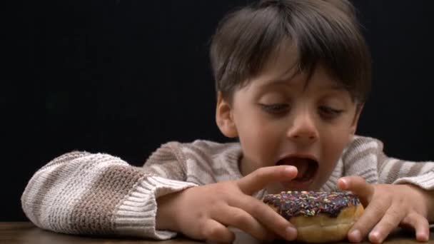 Hungry Little Boy Grabbing Donut Ready Take Bite Sugar Snack — Stock Video