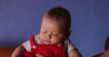 Three month old baby portrait observing and learning