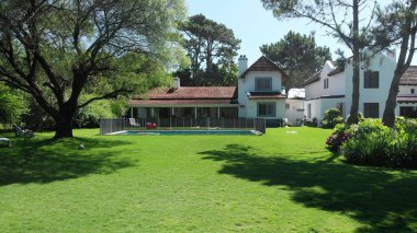 Beautiful home exterior. Establishing shot of house in sunny day