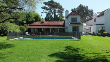 Beautiful home exterior. Establishing shot of house in sunny day