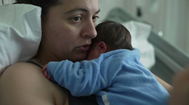 New mother in hospital bed holding newborn baby on chest, showcasing bonding and emotional connection, healthcare setting, postnatal care, nurturing love, and modern motherhood