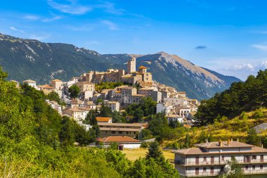 Panorama of the town of Castel del Monte in the province of L'Aquila located in the Gran Sasso and Monti della Laga National Park, in Abruzzo. Italy. clipart