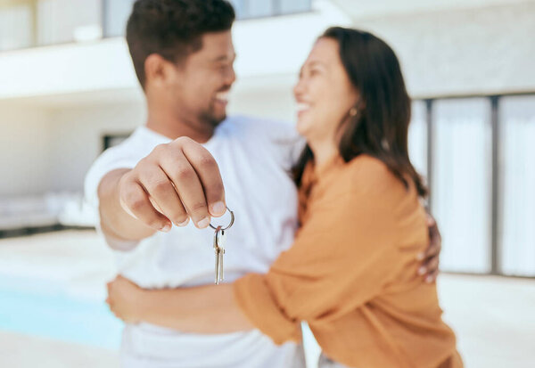 Couple, hand and key to new real estate, property or house with mortgage loan approval, sales deal success or security investment. Zoom, smile or happy homeowner man and woman in hug and love bond.