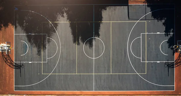 Basketball court, sports background and outdoor community playground for competition, training ground and ball game. Aerial view, outline, net and top floor space of urban performance stadium.