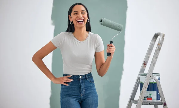 Painting, ladder and hardware of woman in home renovation, room design color, and project development wall with excited portrait. Eco friendly green paint, brush and excited or happy woman painter.