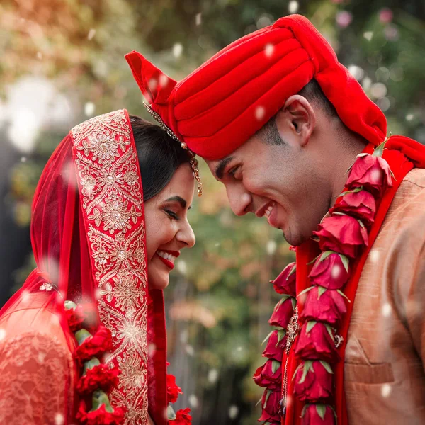 Heres to love and happily ever after. a young hindu couple on their wedding day