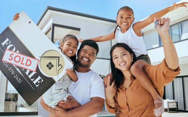 Real estate, house and portrait of family with sale poster and happy with home, mortgage and property investment. Smile, success and achievement with parents and children for luxury, growth or future.