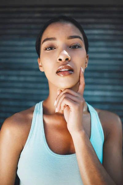 Black woman, beauty make up and fitness healthcare or wellness motivation. Portrait of young African beautiful female, confident face and health athlete active lifestyle against background in city.