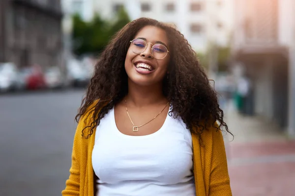 stock image Happiness is my middle name. Cropped portrait of a happy young woman standing outdoors in an urban setting