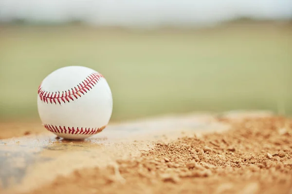 Baseball closeup, field and sports training outdoors for fitness, sport health and competition game. Athletic exercise equipment, softball motivation and match or baseball field bokeh background.