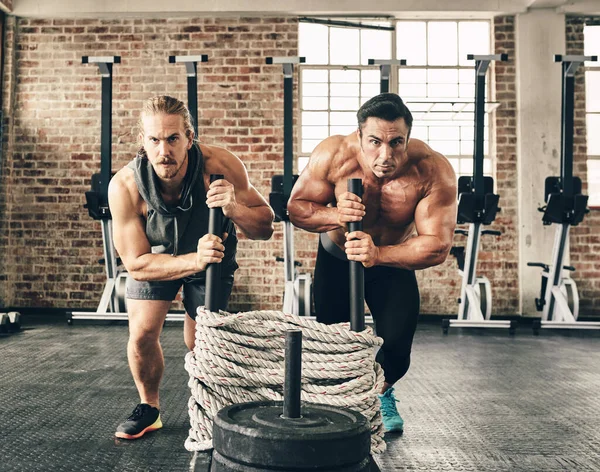 Lets Together Two Fit Determined Young Men Making Use Weights — Stock Photo, Image