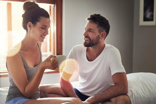 stock image I could never get bored of our conversations. a happy young couple in the morning at home