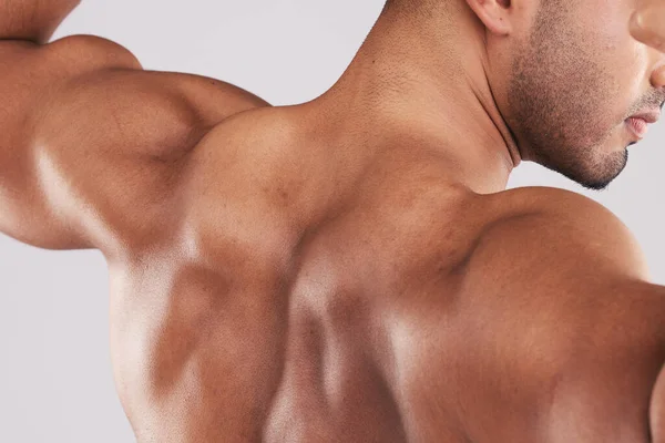 Rug Bodybuilder Flex Spier Voor Concurrentie Gewichtheffen Trots Voor Lichaamsverzorging — Stockfoto