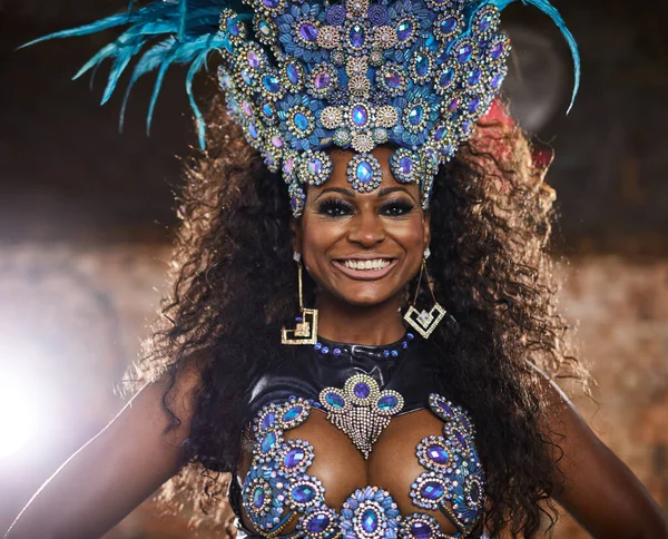 This samba queen is ready to party the night away. Portrait of a samba dancer performing in a carnival