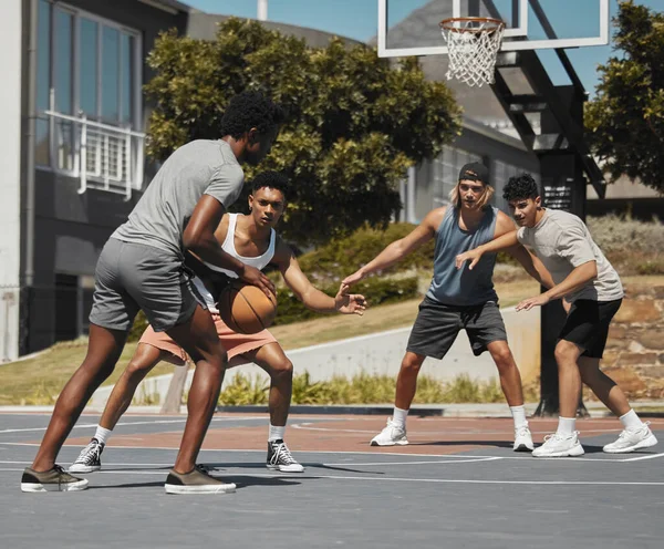 Basketball, fitness and men in sports game for exercise, workout or training on the court in the outdoors. Active athletic players in sport match playing ball together for healthy fun cardio outside.