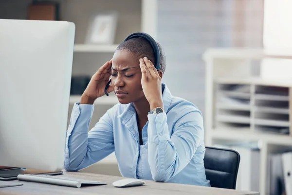 Black woman headache, call center stress and burnout, computer 404 fail glitch and receptionist pain at sales agency office desk. Angry, frustrated and anxiety consultant worker, problem and mistake.