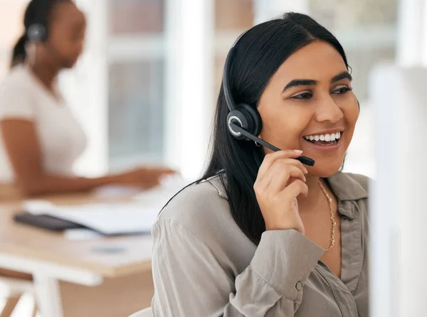 Computer, talking and woman in call center, contact us or customer support in crm consulting, business help or b2b sales deal. Smile, happy and telemarketing worker on communication office technology.
