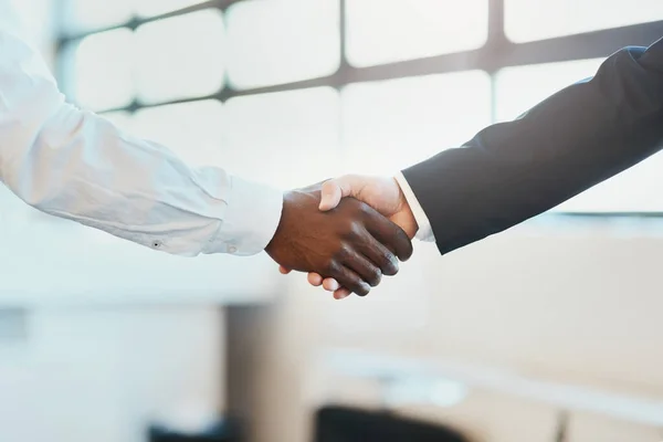 stock image Looks like we have a deal. Closeup of two unrecognizable businesspeople shaking hands in agreement inside of the office at work