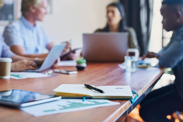 stock image Where the creative talent comes to meet. an open notebook on the table in a meeting room