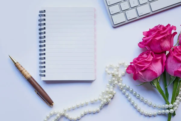 stock image Express yourself in writing. Studio shot of a diary and pen placed with other still life objects against a grey background