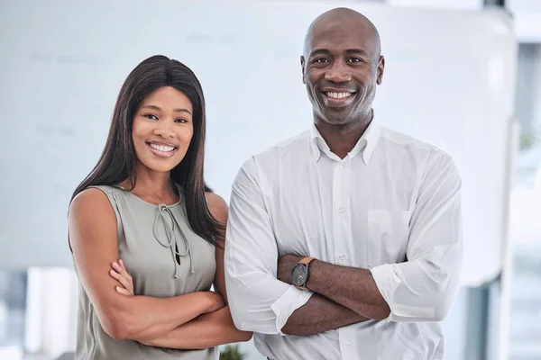 Businessman, black woman or arms crossed in creative office, marketing or advertising company and leadership, power or target goals. Portrait, smile or happy teamwork collaboration in success mindset.