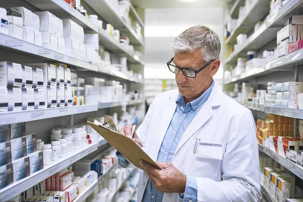 Have Write All Focused Mature Male Pharmacist Making Notes Medication — Stock Photo, Image