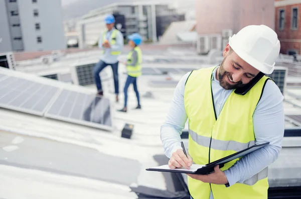 Construction, phone call and businessman writing checklist during building inspection on the roof. Engineer, architect and builder on mobile communication outside on an industrial site with notes.