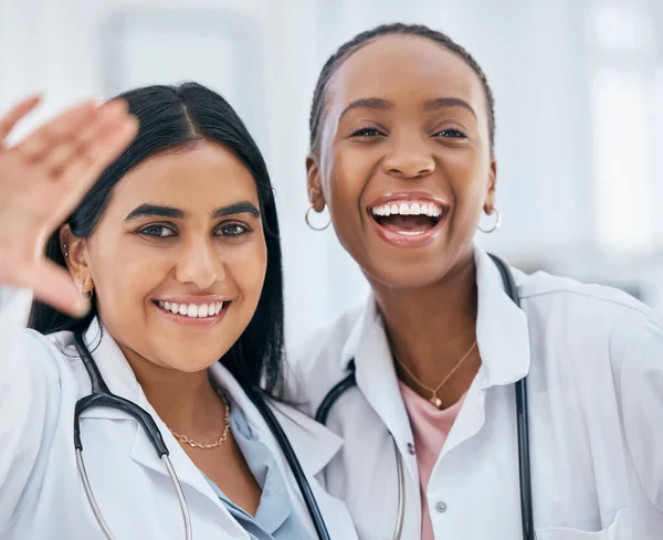 Nurse, doctor and selfie of women happy in a hospital and wellness health clinic with a smile, Portrait of a female medical team with diversity and happiness ready for healthcare work and nursing.
