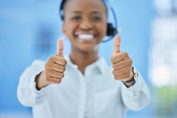 stock image Thumbs up, success and black woman consultant at call center with customer service promotion, achievement or win. Happy, yes and agreement of telemarketing worker excited for career development