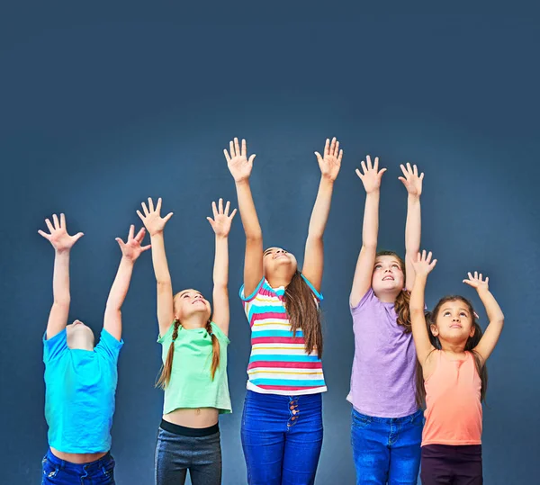 Nothing Out Reach Studio Shot Diverse Group Kids Stretching Arms — Stock Photo, Image