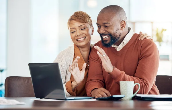 Wave, laptop and happy black couple on a video call in conversation, talking and speaking to friends. Smile, social and social black woman saying hello with partner to black people on the internet.