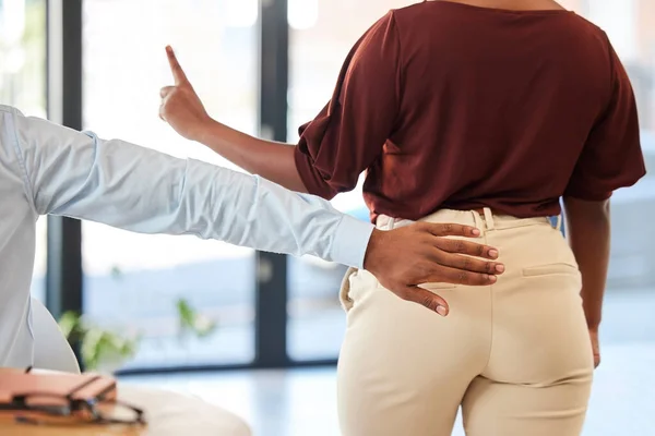 Corporate, sexual harassment and stop hand sign of a business woman and man in a office. Wrong businessman employee ready to touch a walking female employee, worker and company staff butt at work.