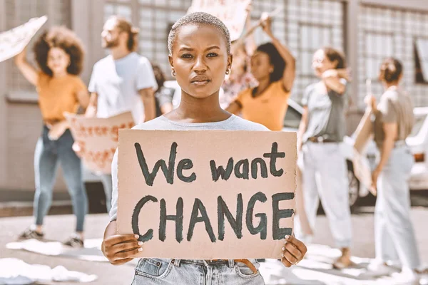 Black woman, protest group and sign about peace, justice and gender equality in SA for political leadership. Freedom, human rights and activist marching against climate change, racism and corruption.
