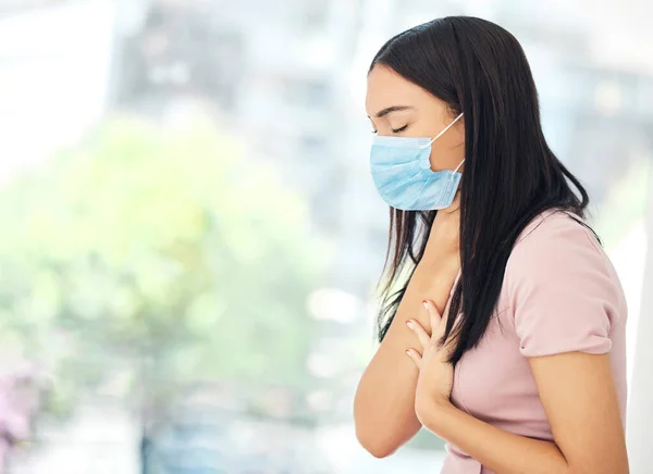 stock image Covid, mask and woman with sore throat, healthcare and sick at work, chest pain and respiratory problem. Health, virus and illness during pandemic, infection and inflammation with breathe issue