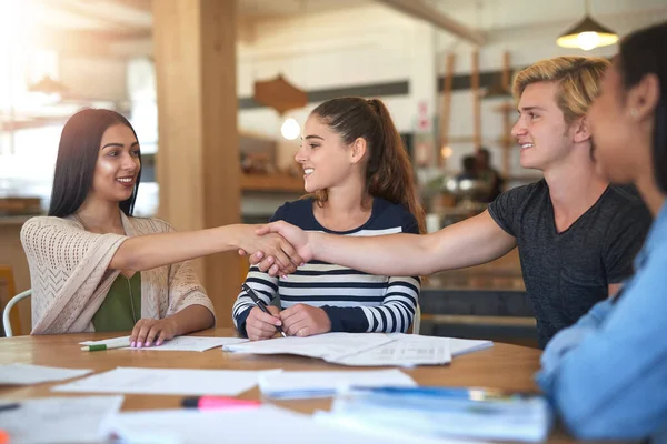 stock image Welcome to our little study group. a group of students welcoming a newcomer to their study group in a cafe