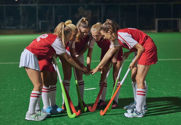 Hockey, together hands and women teamwork, support or motivation for game, competition or training strategy communication. Leadership, sports and group hand stack circle in target goal collaboration.
